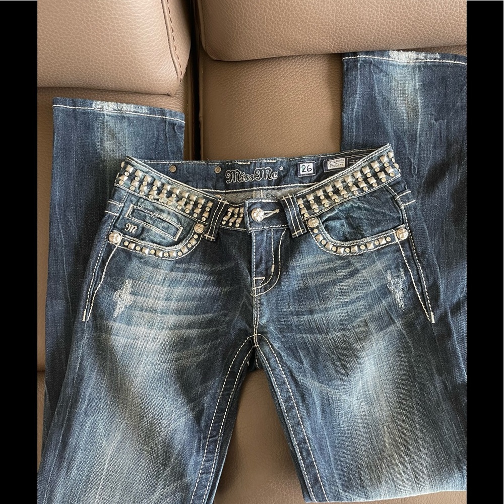 Stunning Distressed Miss Me Boot Jeans.